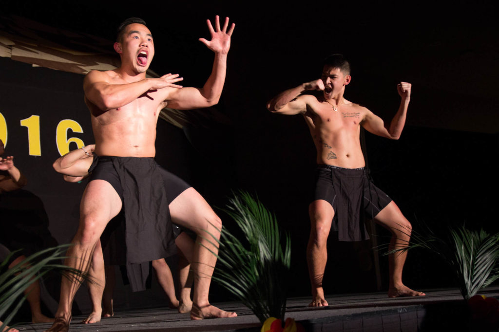 The men perform the Haka, a traditional warrrior dance and a staple of many Pacific Islander cultures