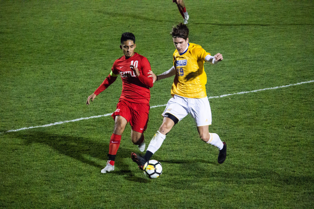 Sergio Rivas dribbles the ball down the flank of Championship field.