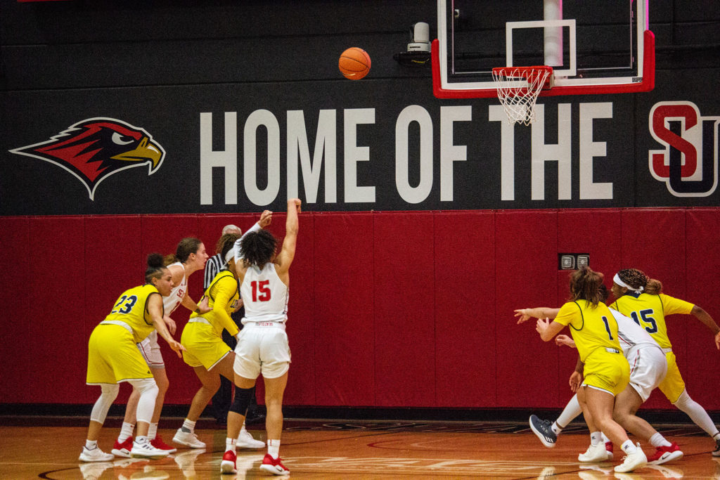 Kamira Sanders shoots a free-throw as fellow Redhawks prepare to box-out for the rebound.