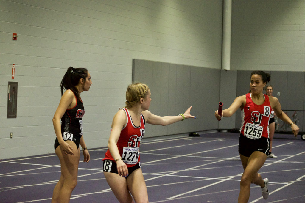 Junior Lisa Cooney hands off to Sophmore Elle Stein in the women’s DMR, which
Seattle University still holds the WAC indoor title for.