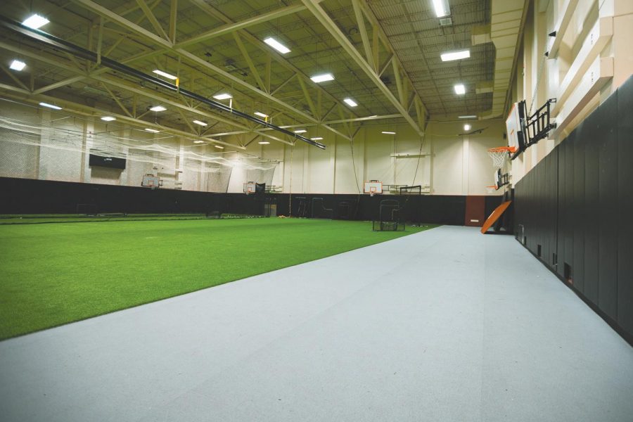 With loss of access to the South Court facilities in the Redhawk Center, students struggle to accept the Astroturf Gym as their new recreation area.