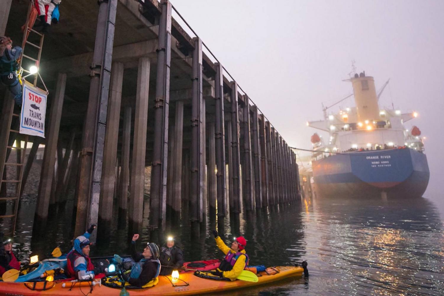 Protesters in a kayak blocking the Port of Vancouver