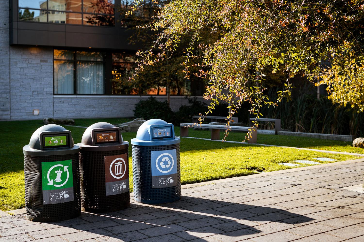 Compost, trash, and recycle bins on campus
