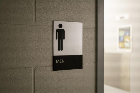 “Men’s” sign outside a bathroom in Campion. /Jake Nelson