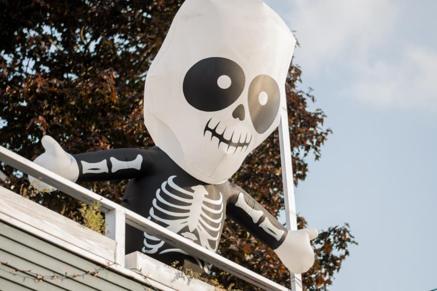 Skeleton+Halloween+decor+hanging+by+a+Capitol+Hill+house.