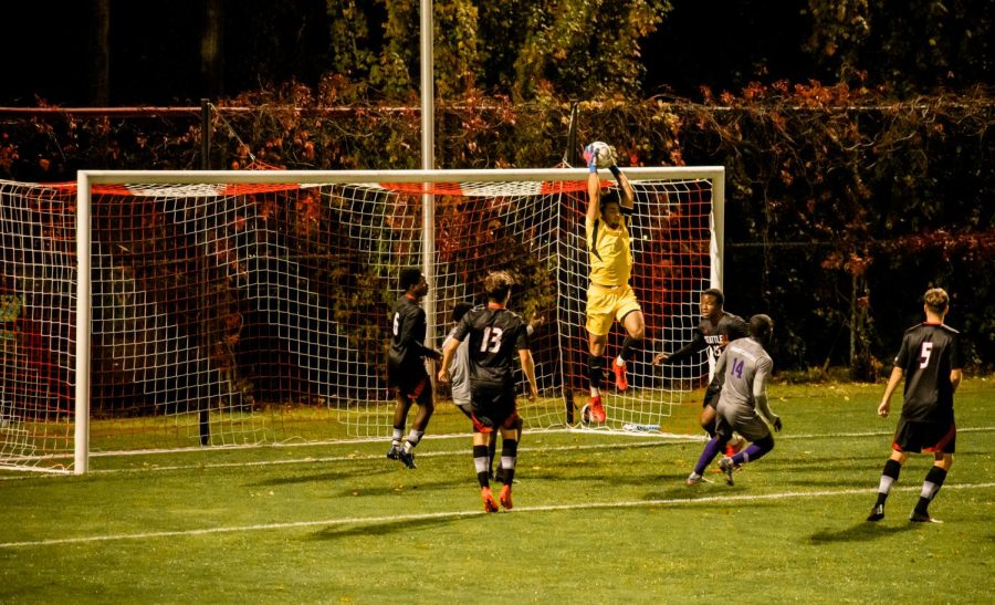 Goalie Akili Kasim making a save at the home game against Grand Canyon University
