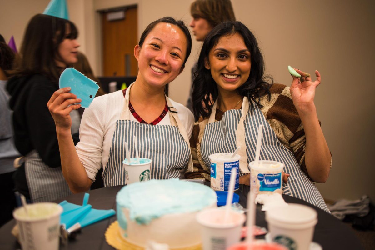 Two+Seattle+U+students+at+SEACs+cake+decorating+competition.