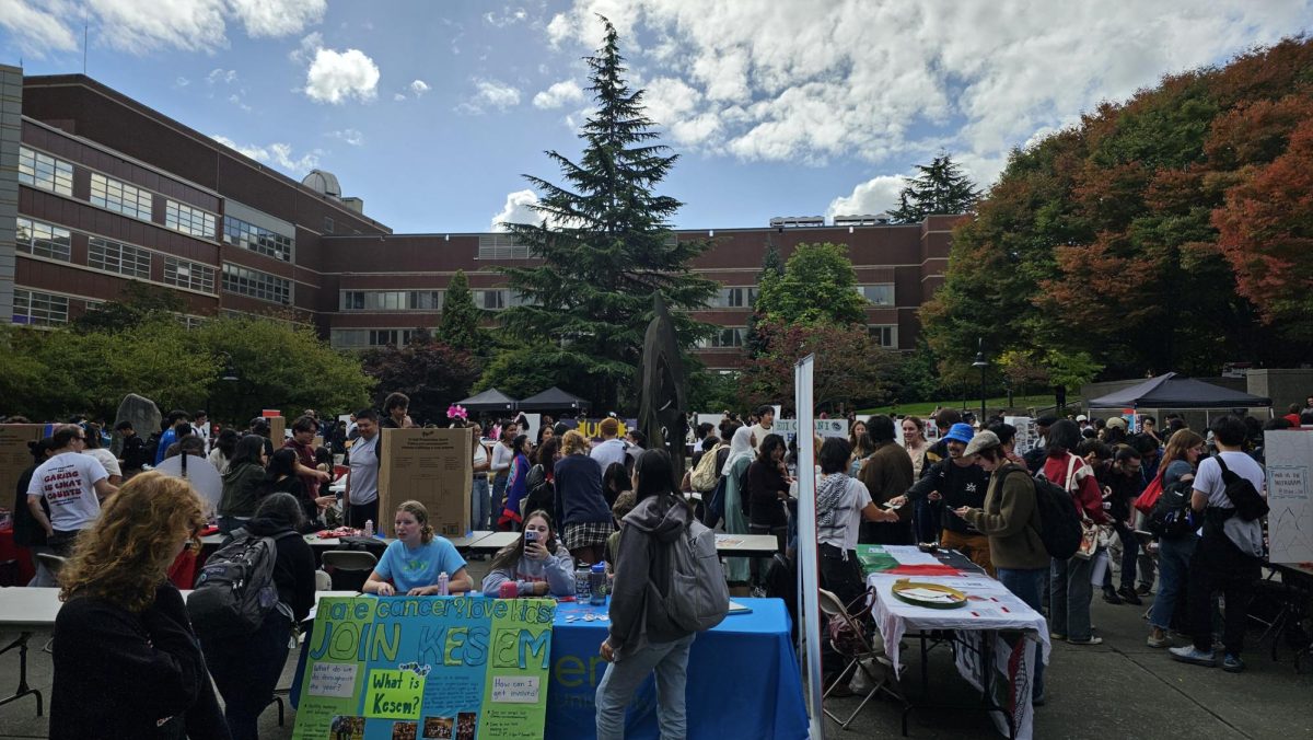 Students explore the various tables at the Involvement Fair.