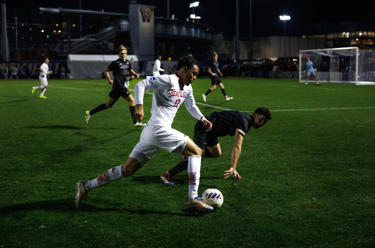 Forward Yeider Zuluaga taking on UW defender in second half.