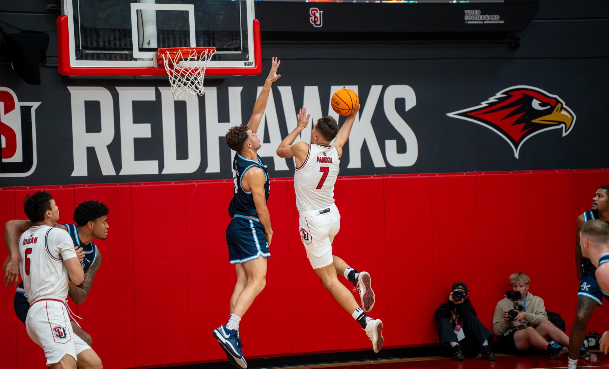 Redhawks Men’s Basketball Falls to Liberty Flames on Homecoming Night  