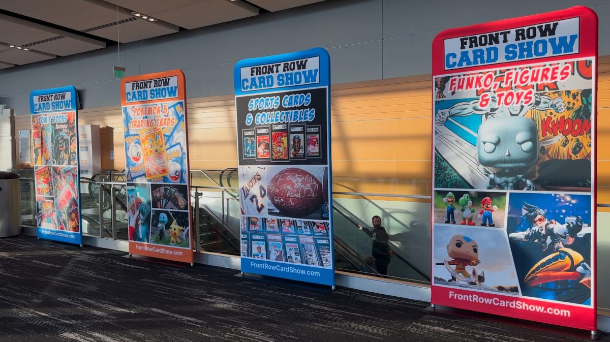 Banners outside the Greater Tacoma Convention Center display various forms of memorabilia on display at Front Row Card Show’s January 19 show.