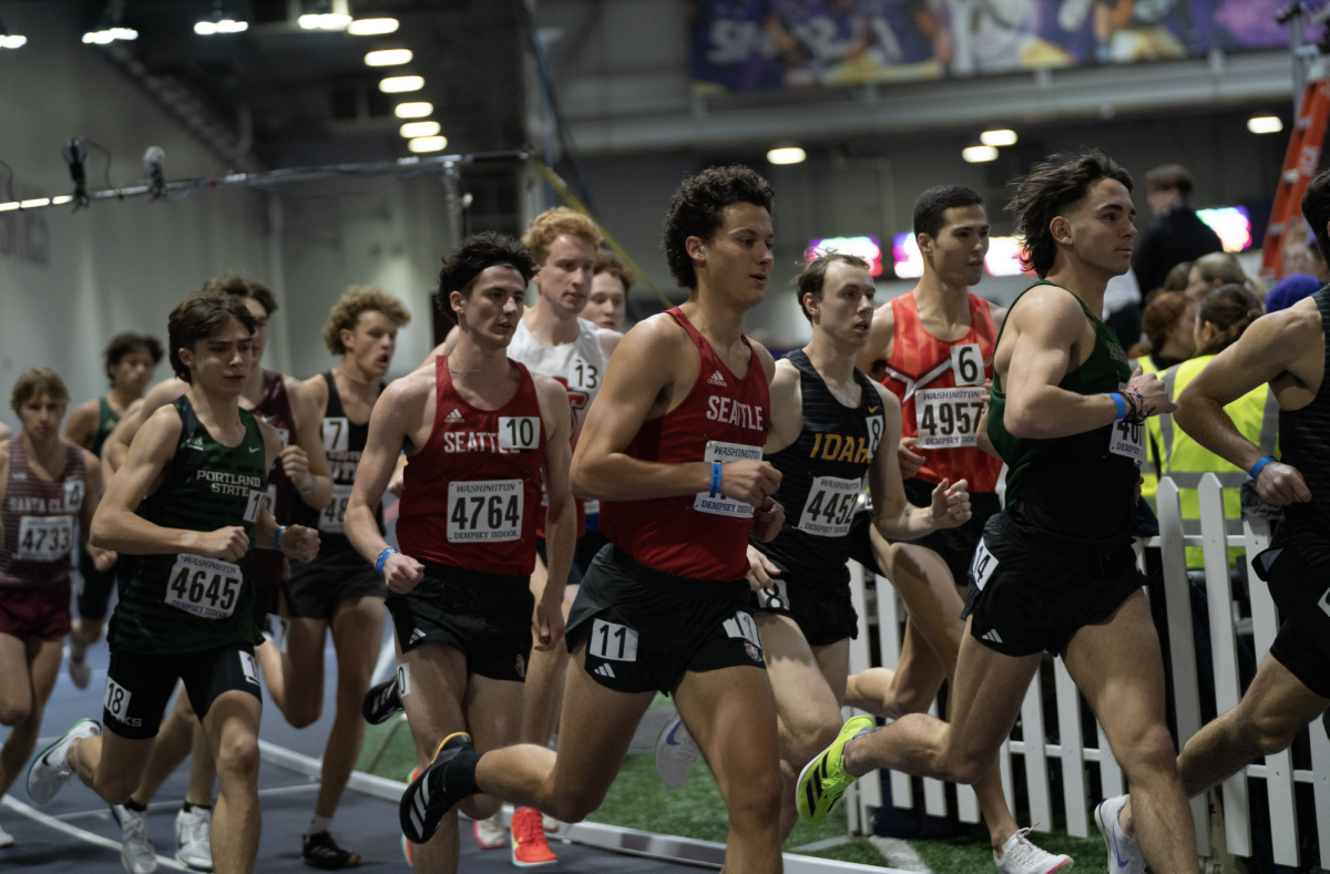 Sophomore, Dan Barreto and Freshman, Porter Buck competing in the 1 Mile Run.