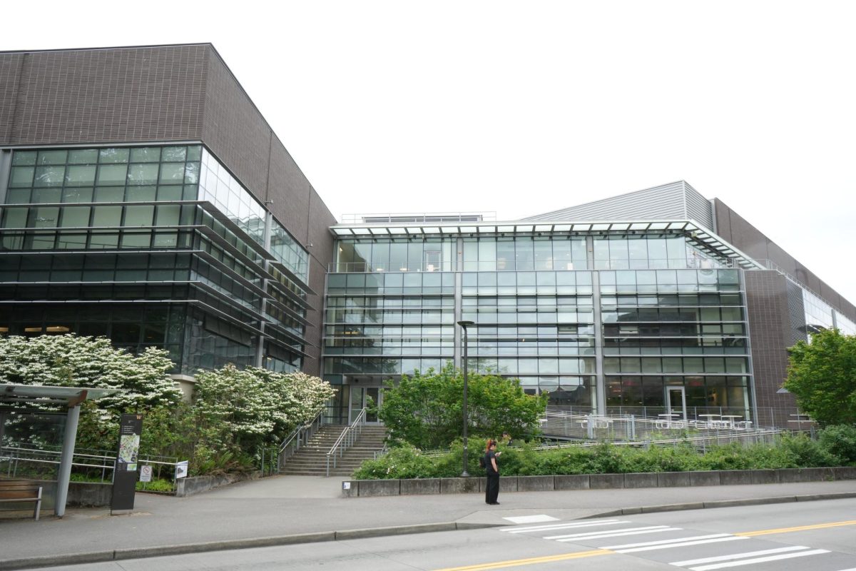 The Husky Union Building reflects the sun's light.