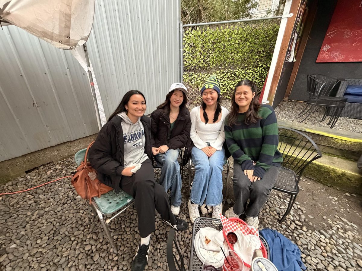A group of fans hanging out on the patio of the Chieftian.