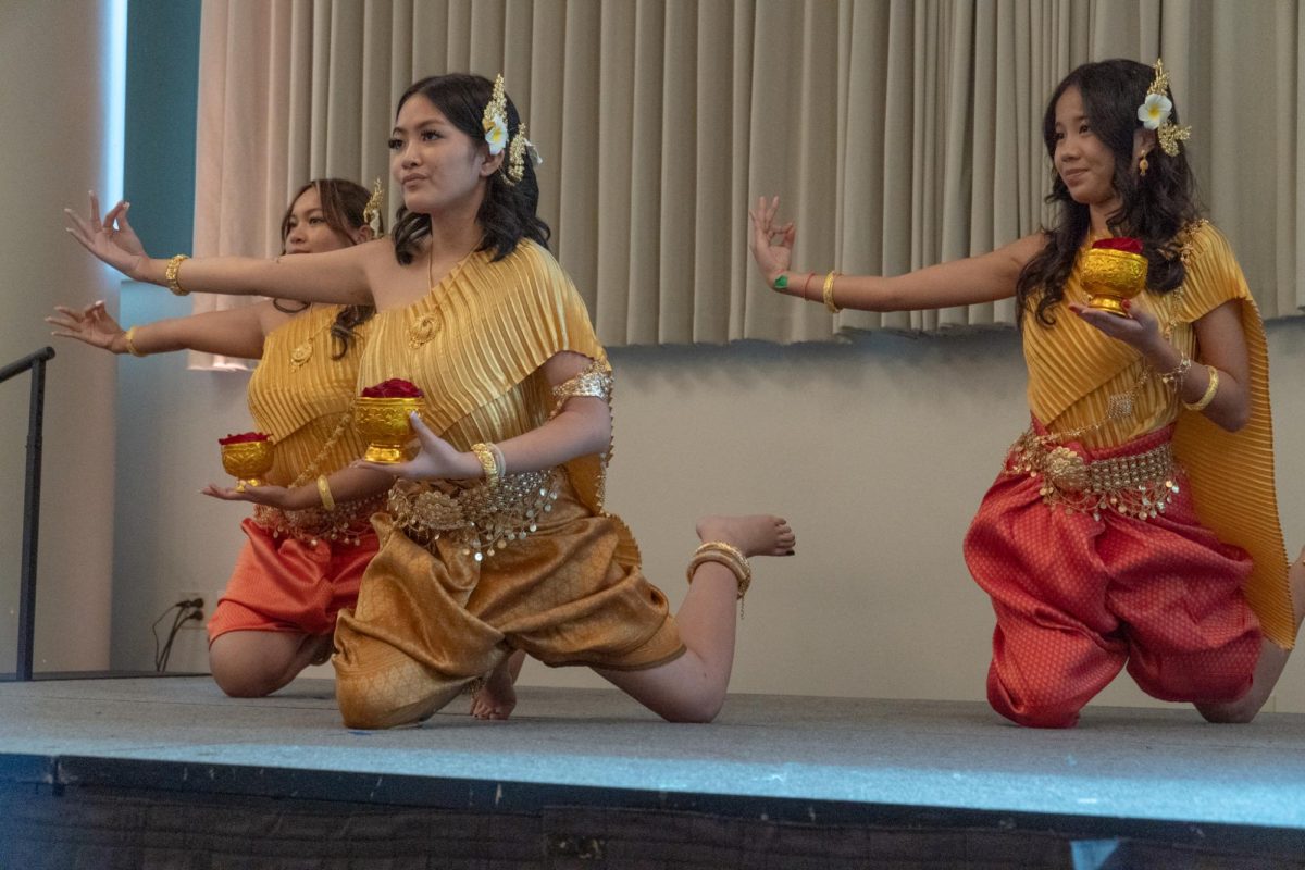 Khmer Student Association officers performing Robam Jun Por. Left to right: Vice President Ellana Meas, Public Relations Dalyce Caoagdan, President Kate Sea 