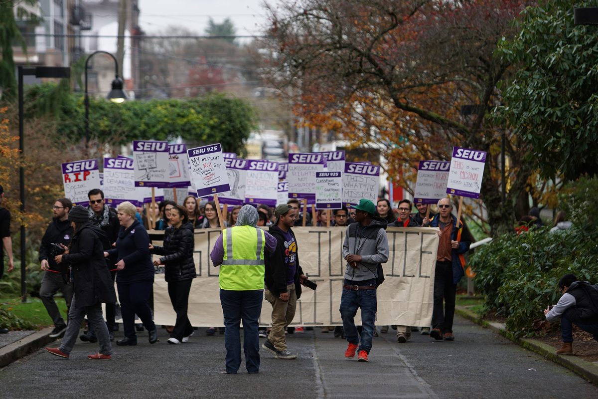 Union protesters march into the administration building in 2016.
This photo originally appeared online with the article titled "Students, Faculty Keep Unionization Fight Alive"