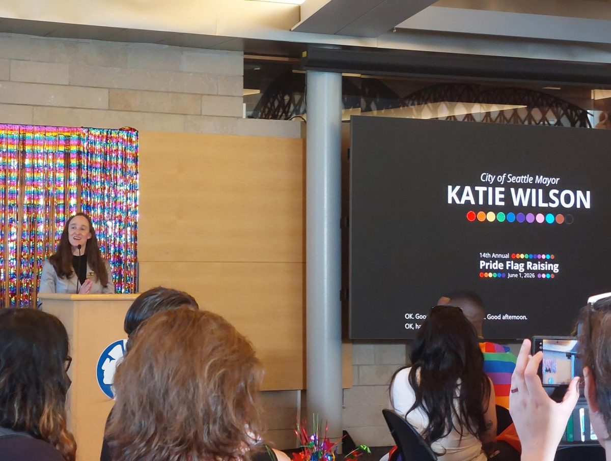 Mayor Katie Wilson addresses the crowd at Seattle's 14th annual Pride flag raising ceremony.